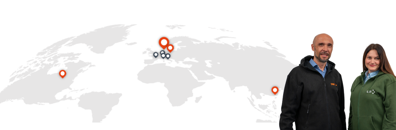 Team members in DBI Plastics branded hoodies with a map of global locations.